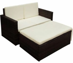 2-cz. brązowy komplet rattanowy do ogrodu Ugis – sofa dwuosobowa, podnóżek, rattan PE, kremowe poduszki