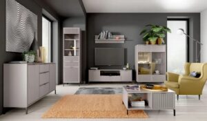 Beżowa szafka rtv z lamelami na nóżkach – funkcjonalny design, kolor cashmere, wymiary 165,3×55,6×40,6 cm, płyta laminowana