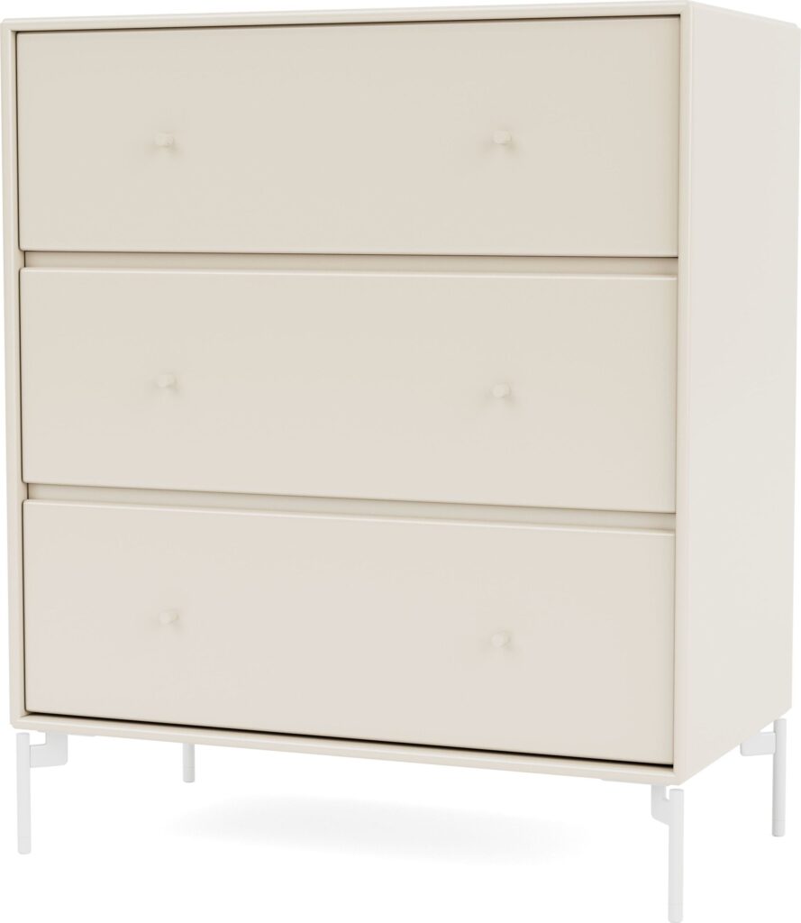 Komoda Carry jasnobeżowa na białych nogach – styl skandynawski, funkcjonalność, elegancki design