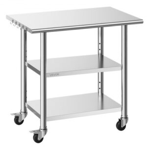 Stół roboczy VEVOR Gasto 915 x 610 x 864 mm, wykonany ze stali nierdzewnej, z 3 poziomami, kółkami i półkami o regulowanej wysokości. Nośność: górna półka 227 kg i 2 dolne półki po 191 kg każda. Stół do przygotowywania potraw dla restauracji.